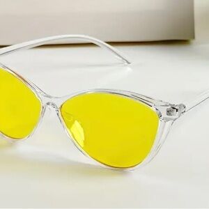 Like new, clear cat eye frame with yellow anti-glare fashion glasses.